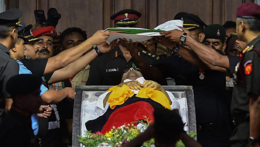 Karunanidhi buried beside mentor Annadurai